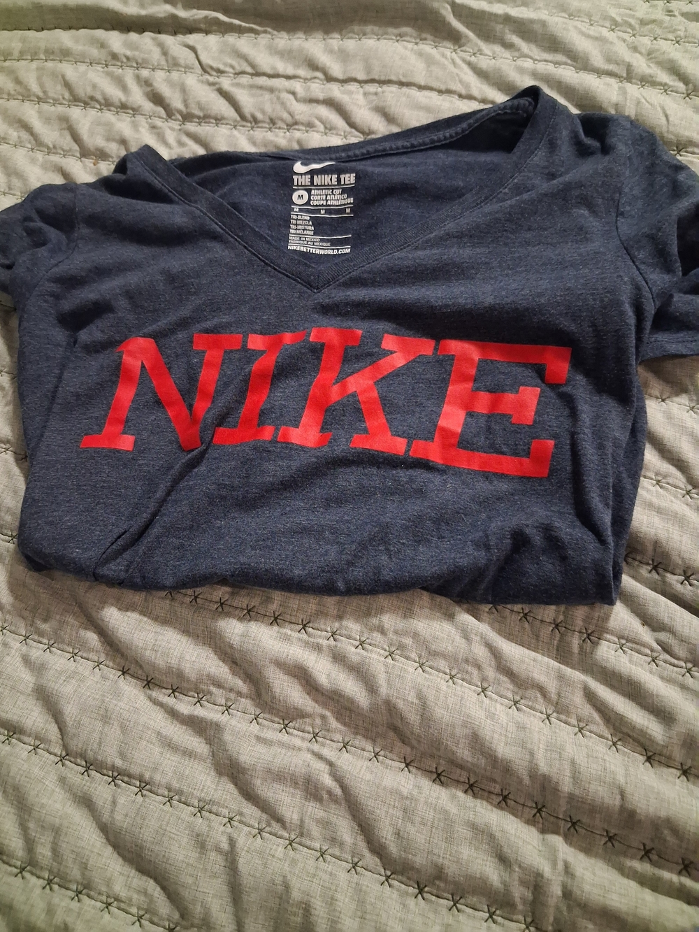 Nike Ladies Navy V-Neck Tee with Red NIKE Graphic
